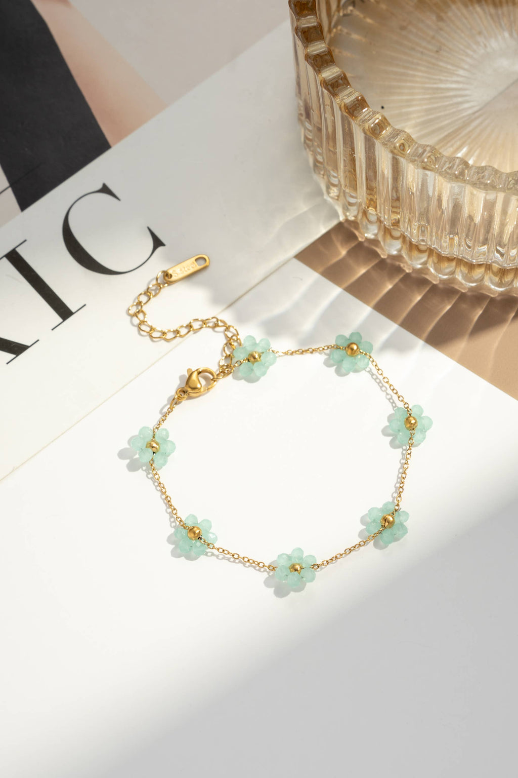 Bracelet acier inoxydable petite fleur colorée lumineux: Blanc