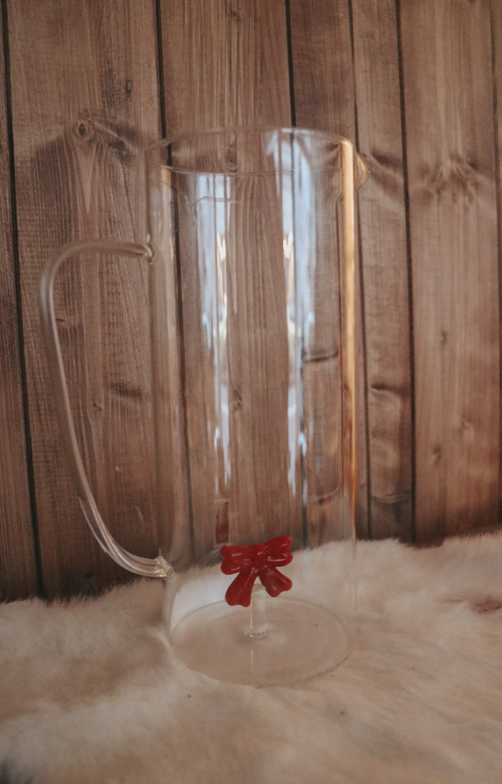 Cruche en verre avec noeud