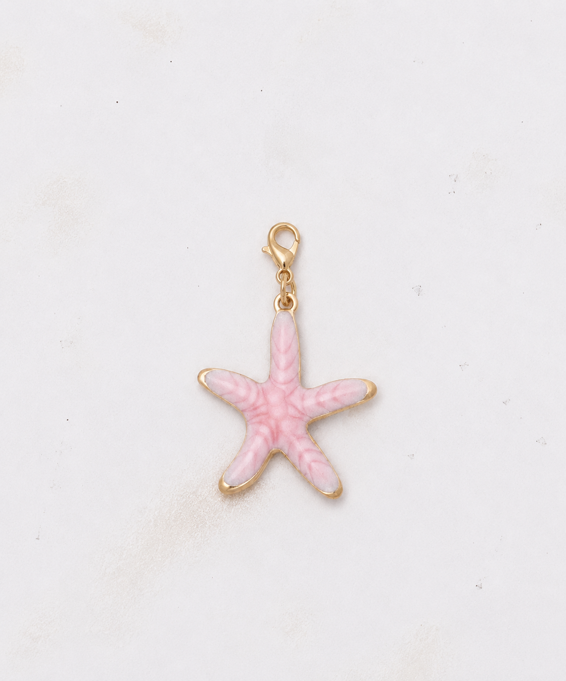 Charms étoile vernie rose