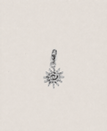 Charms soleil argenté