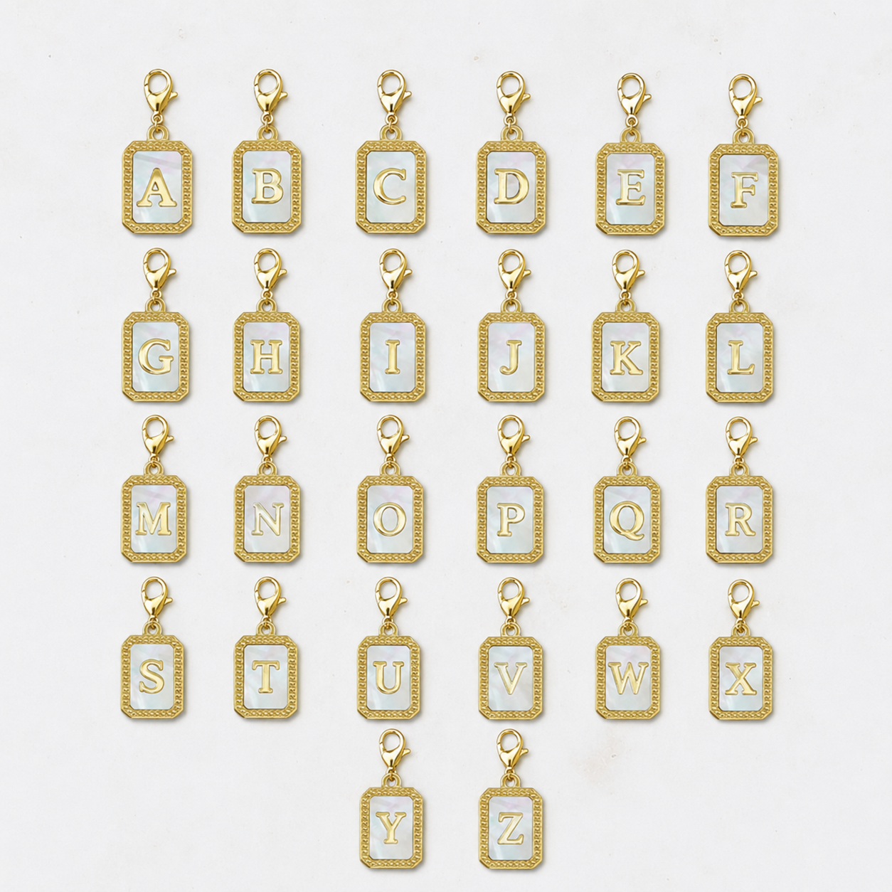 Charms alphabet doré et nacre