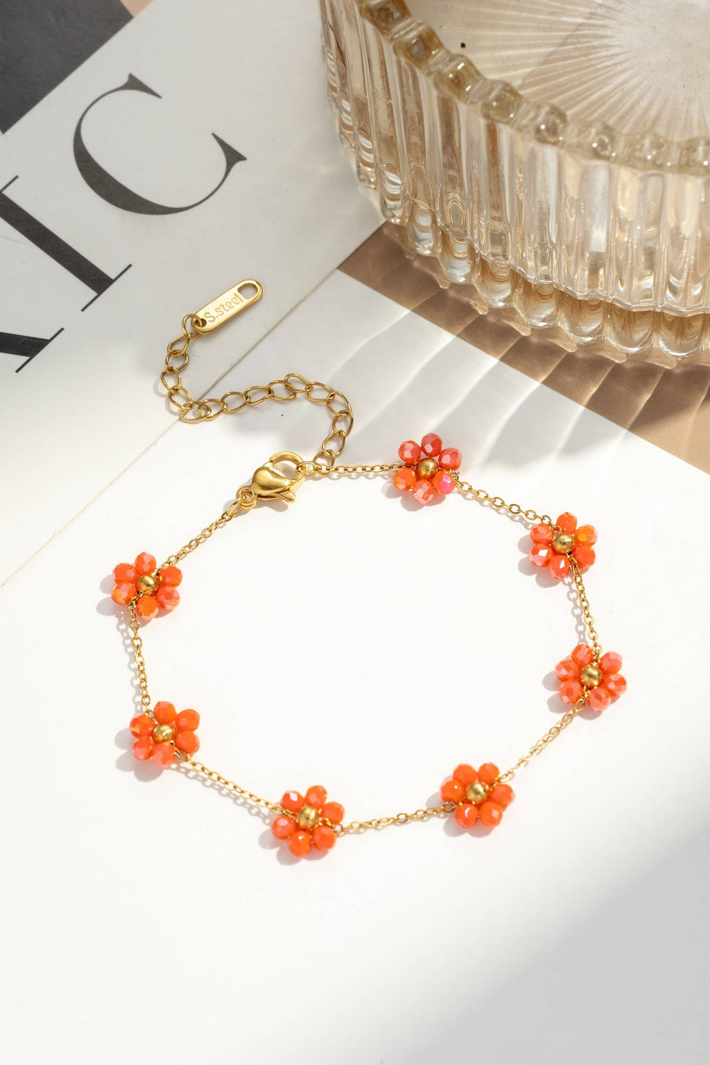 Bracelet acier inoxydable petite fleur colorée lumineux: Rouge Orangé